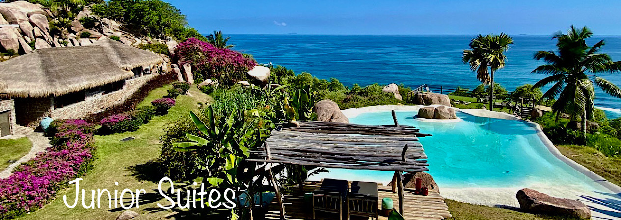 Chambre Junior Suite de luxe avec vue panoramique sur l'océan des Seychelles